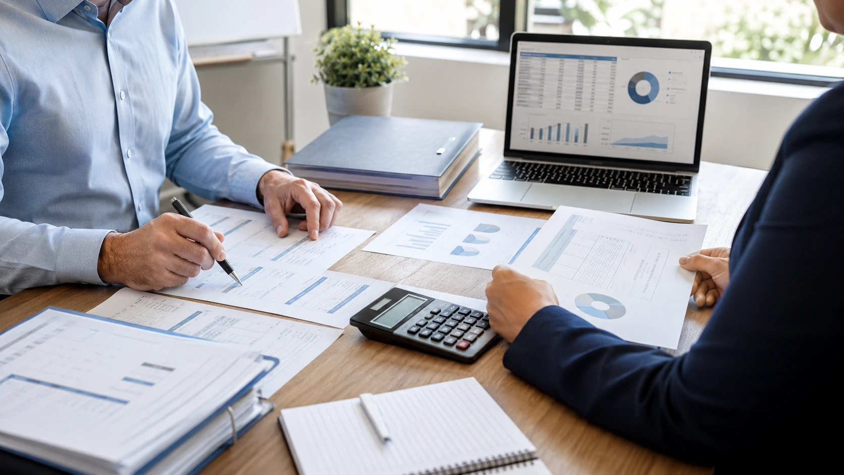 Business owner reviewing Division 7A loans and private company tax records before 30 June